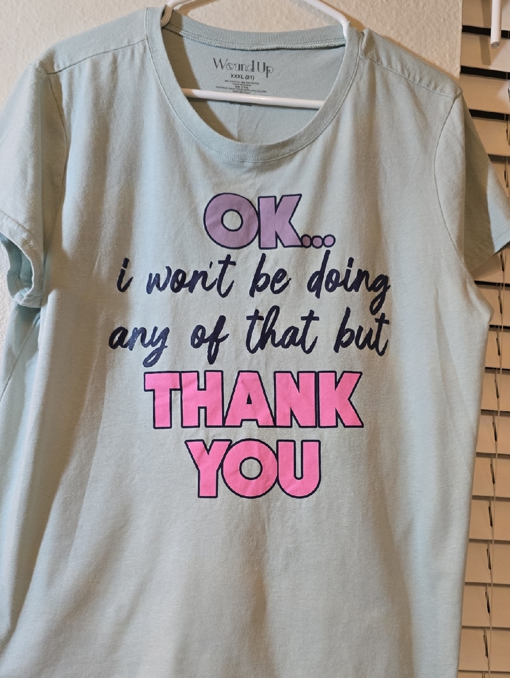 Wound Up Light Blue Graphic Tee with Pink & Purple Lettering
